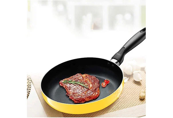 yellow cooking wok